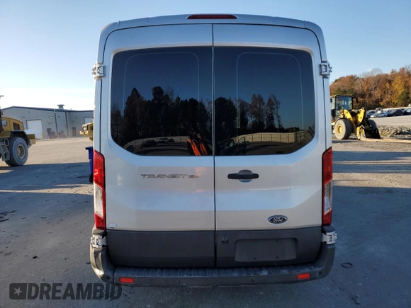 2016 Ford Transit Cargo with VIN 1FTYE1CM5GKB56512, listed as a Copart auction lot 82561724 with Not Provided miles and Salvage Title. Bid and sale history available at carsss.com. Image 6.