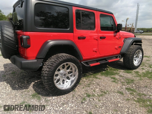 2024 Jeep Wrangler Sport S with VIN 1C4PJXDNXRW110431, listed as a IAAI auction lot 42156570 with 9,699 mi miles. Bid and sale history available at carsss.com. Image 4.