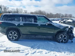 2024 Rivian R1S Adventure with VIN 7PDSGBBA9RN042780, listed as a IAAI auction lot 41440424 with 10,747 mi miles. Bid and sale history available at carsss.com. Image 14.