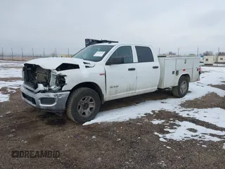 2020 Ram 2500 Tradesman with VIN 3C6UR4HJ1LG261432, listed as a IAAI auction lot 41573636 with 154,147 mi miles. Bid and sale history available at carsss.com. Image 2.
