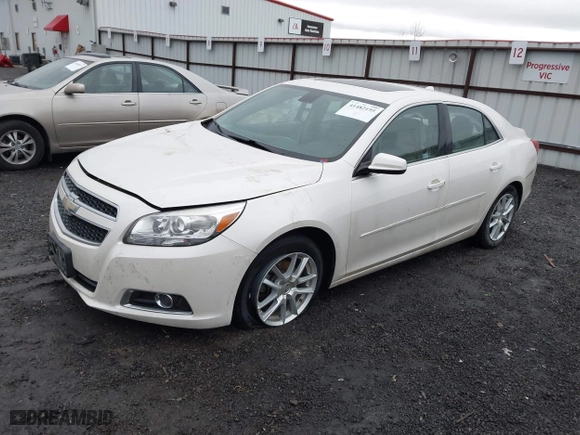 2013 Chevrolet Malibu ECO with VIN 1G11F5SR9DF213715, listed as a IAAI auction lot 41482195 with 138,628 mi miles. Bid and sale history available at carsss.com. Image 2.