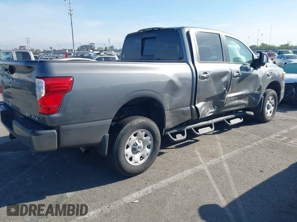 2021 Nissan Titan SV with VIN 1N6AA1FA6MN529806, listed as a IAAI auction lot 41859992 with 50,729 mi miles and . Bid and sale history available at DreamBid. Image 4.