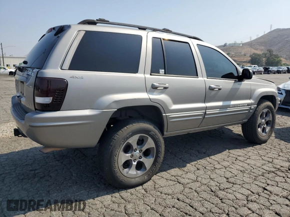 2001 Jeep Grand Cherokee Limited with VIN 1J4GW58N11C721108, listed as a Copart auction lot 60176915 with 257,907 mi miles and Salvage title. Bid and sale history available at DreamBid. Image 3.