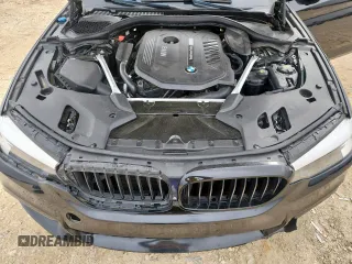 2018 BMW 5 Series 540i xDrive with VIN WBAJE7C52JWD52730, listed as a Copart auction lot 60297425 with 104,208 mi miles and Salvage title. Bid and sale history available at DreamBid. Image 11.