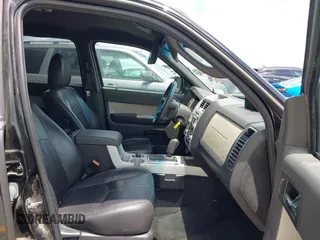2011 Mercury Mariner Premier with VIN 4M2CN8HGXBKJ07489, listed as a IAAI auction lot 42574942 with 163,786 mi miles and . Bid and sale history available at DreamBid. Image 5.