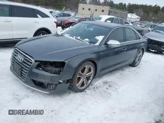 2014 Audi S8 with VIN WAUD2AFD8EN011752, listed as a IAAI auction lot 41556173 with 115,648 mi miles. Bid and sale history available at carsss.com. Image 2.