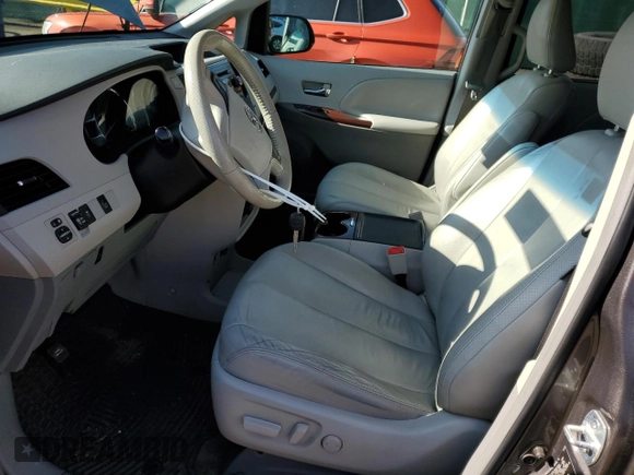 2014 Toyota Sienna Limited with VIN 5TDDK3DC8ES078175, listed as a Copart auction lot 61138585 with 98,527 mi miles and Salvage title. Bid and sale history available at DreamBid. Image 7.