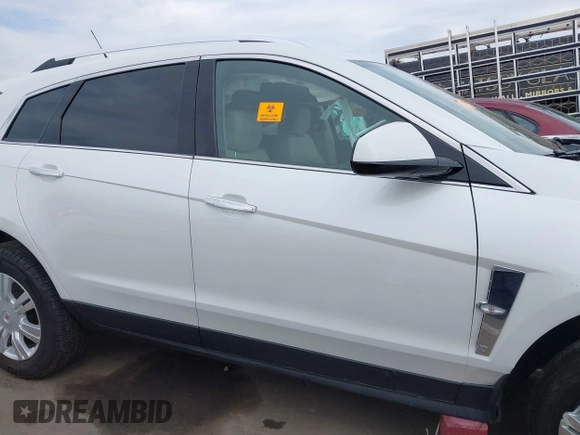 2012 Cadillac SRX Luxury Collection with VIN 3GYFNAE34CS606963, listed as a IAAI auction lot 41815097 with Not Provided miles and . Bid and sale history available at carsss.com. Image 13.