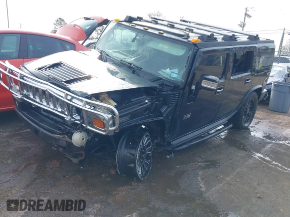 2006 Hummer H2 with VIN 5GRGN23U06H113353, listed as a IAAI auction lot 41476649 with 165,370 mi miles. Bid and sale history available at carsss.com. Image 17.