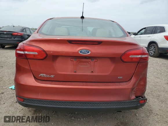 2018 Ford Focus SE with VIN 1FADP3F21JL316763, listed as a Copart auction lot 50241445 with 104,830 mi miles and Salvage Title. Bid and sale history available at carsss.com. Image 6.