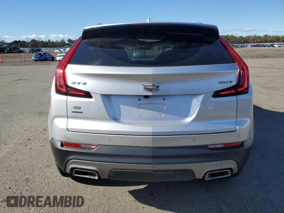 2022 Cadillac XT4 AWD Premium Luxury with VIN 1GYFZDR42NF100239, listed as a Copart auction lot 80175144 with 48,088 mi miles and Salvage Title. Bid and sale history available at carsss.com. Image 6.