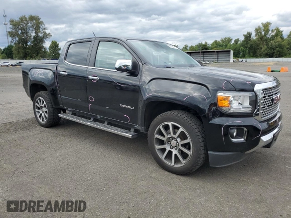 2020 GMC Canyon 4WD Denali with VIN 1GTG6EEN0L1243031, listed as a Copart auction lot 67939014 with 106,294 mi miles and Salvage Title. Bid and sale history available at carsss.com. Image 4.