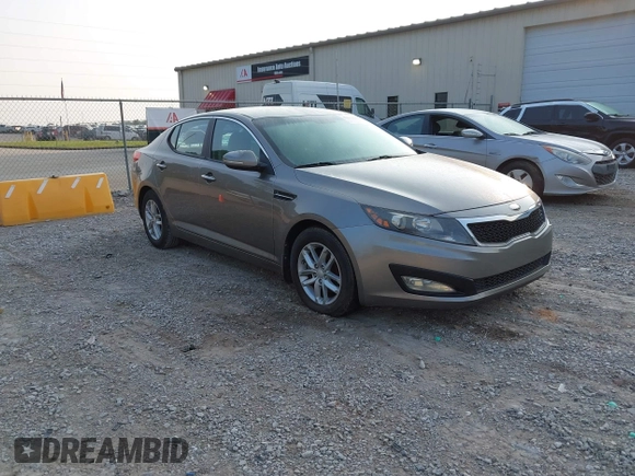 2013 Kia Optima LX z VIN 5XXGM4A79DG200479, wystawiony jako IAAI lot #42412641 z przebiegiem 183 916 mil mil oraz . Historia ofert i sprzedaży dostępna na DreamBid. Obrazek 1.