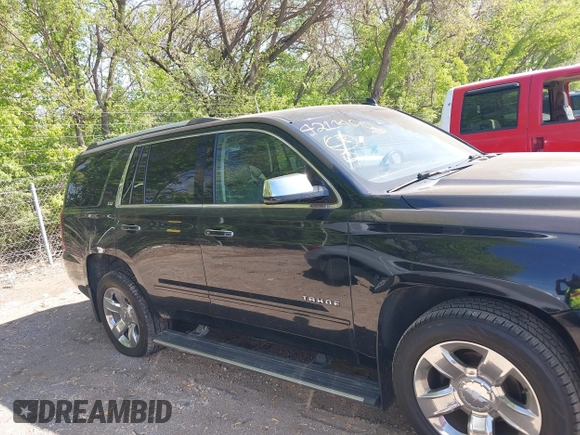 2015 Chevrolet Tahoe LTZ z VIN 1GNSKCKC8FR141163, wystawiony jako IAAI lot #42114008 z przebiegiem 221 804 mil mil oraz . Historia ofert i sprzedaży dostępna na DreamBid. Obrazek 13.