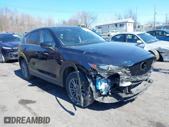2017 Mazda CX-5 Touring with VIN JM3KFBCL8H0201074, listed as a IAAI auction lot 41747146 with 42,092 mi miles. Bid and sale history available at carsss.com. Image 1.