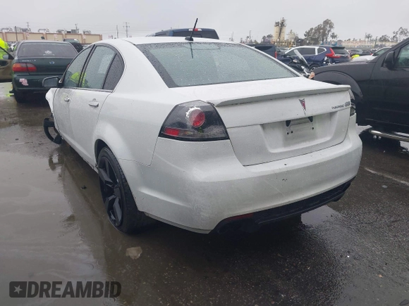 2009 Pontiac G8 GT with VIN 6G2EC57Y99L231004, listed as a IAAI auction lot 41572279 with 104,532 mi miles. Bid and sale history available at carsss.com. Image 3.
