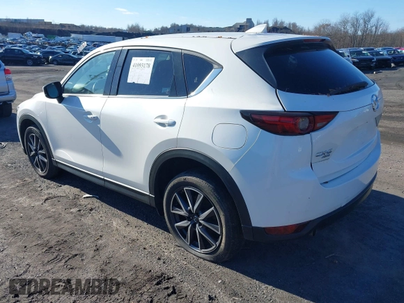 2017 Mazda CX-5 Grand Touring with VIN JM3KFBDL6H0188517, listed as a IAAI auction lot 41093178 with 98,831 mi miles. Bid and sale history available at carsss.com. Image 3.