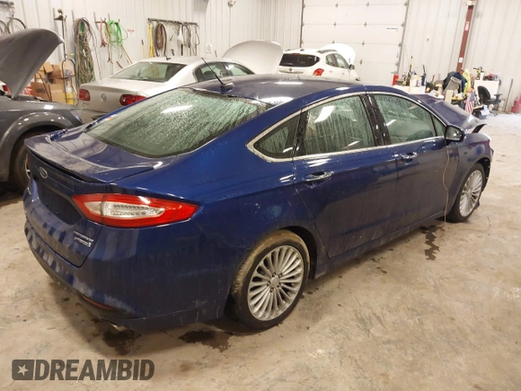 2013 Ford Fusion Titanium Hybrid with VIN 3FA6P0RU9DR320909, listed as a IAAI auction lot 41477530 with 108,153 mi miles. Bid and sale history available at carsss.com. Image 4.