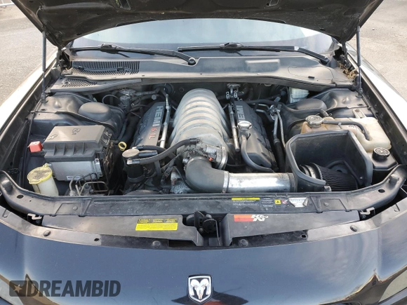 2006 Dodge Charger SRT-8 with VIN 2B3LA73W36H369475, listed as a Copart auction lot 43774705 with 130,495 mi miles and Salvage Title. Bid and sale history available at DreamBid. Image 12.