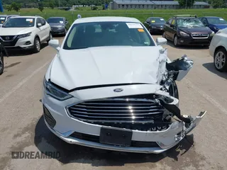2020 Ford Fusion SEL with VIN 3FA6P0CD3LR152711, listed as a IAAI auction lot 42516763 with 97,073 mi miles and . Bid and sale history available at DreamBid. Image 12.