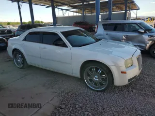 2006 Chrysler 300 with VIN 2C3KA43R56H363006, listed as a Copart auction lot 65469944 with 133,641 mi miles and Salvage Title. Bid and sale history available at carsss.com. Image 4.
