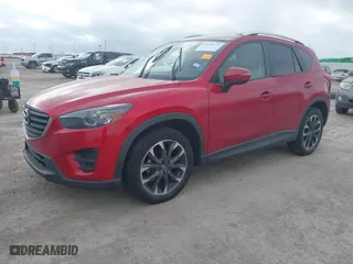 2016 Mazda CX-5 Grand Touring with VIN JM3KE4DYXG0641174, listed as a IAAI auction lot 41182655 with NaN miles. Bid and sale history available at carsss.com. Image 17.