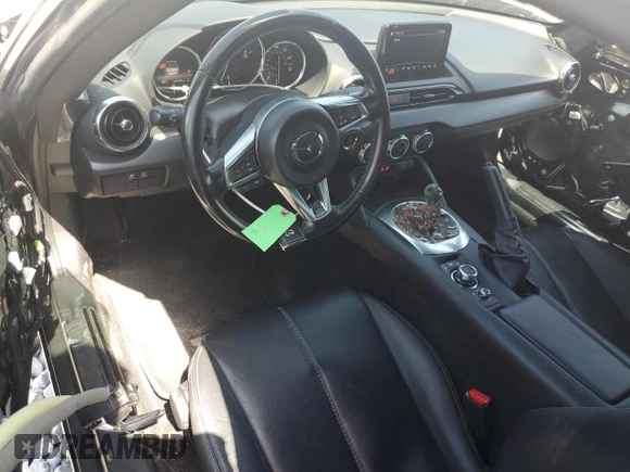 2020 Mazda MX-5 Miata Grand Touring z VIN JM1NDAD77L0414873, wystawiony jako Copart lot #54767785 z przebiegiem 47 579 mil mil oraz Szkoda całkowita • Salvage title. Historia ofert i sprzedaży dostępna na DreamBid. Obrazek 8.