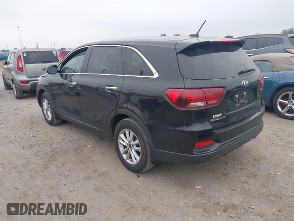 2019 Kia Sorento LX with VIN 5XYPG4A34KG579484, listed as a IAAI auction lot 40971250 with 142,327 mi miles. Bid and sale history available at carsss.com. Image 3.