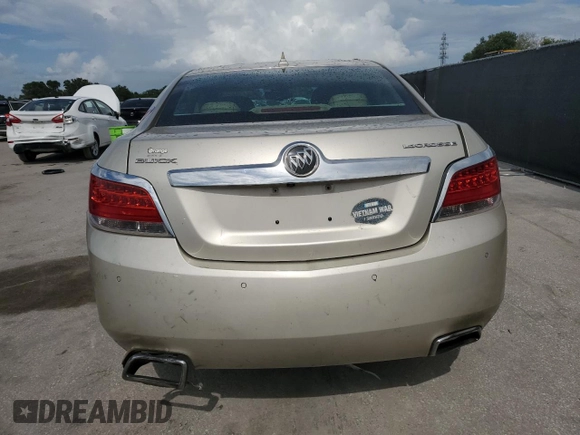 2013 Buick LaCrosse Leather с VIN 1G4GC5E32DF330890, выставлен на аукционе Copart как лот 60721895 с пробегом 122 769 миль миль и Списание • Salvage title. История ставок и продаж доступна на DreamBid. Изображение 6.