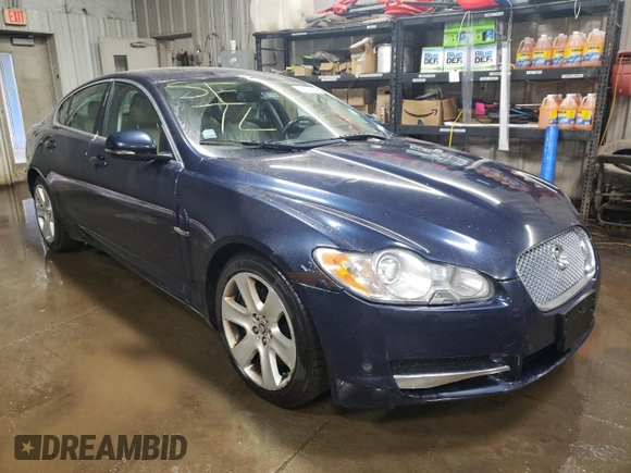 2011 Jaguar XF with VIN SAJWA0FB9BLS12379, listed as a Copart auction lot 41519534 with 135,848 mi miles and Salvage Title. Bid and sale history available at carsss.com. Image 4.