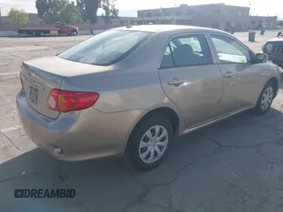2009 Toyota Corolla with VIN 1NXBU40EX9Z065469, listed as a IAAI auction lot 42022537 with 179,819 mi miles. Bid and sale history available at carsss.com. Image 4.