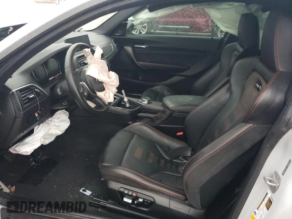 2020 BMW M2 Competition with VIN WBS2U7C01L7D66378, listed as a Copart auction lot 86432704 with 56,973 mi miles and Salvage Title. Bid and sale history available at carsss.com. Image 7.