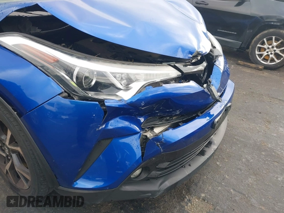 2018 Toyota C-HR XLE with VIN NMTKHMBX5JR051428, listed as a IAAI auction lot 41770474 with 79,770 mi miles and . Bid and sale history available at DreamBid. Image 6.