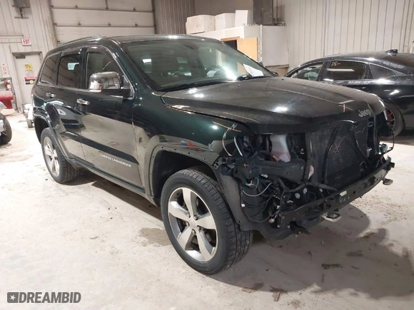 2014 Jeep Grand Cherokee Overland with VIN 1C4RJFCGXEC162109, listed as a IAAI auction lot 41943979 with 147,788 mi miles. Bid and sale history available at carsss.com. Image 1.