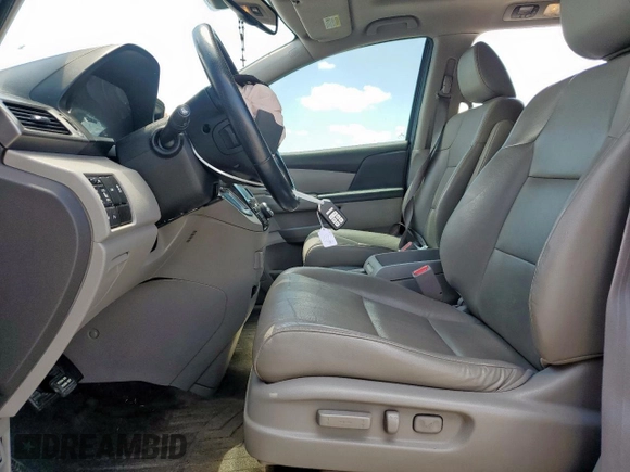 2014 Honda Odyssey Touring with VIN 5FNRL5H97EB037439, listed as a Copart auction lot 62782035 with 153,315 mi miles and Salvage title. Bid and sale history available at DreamBid. Image 7.