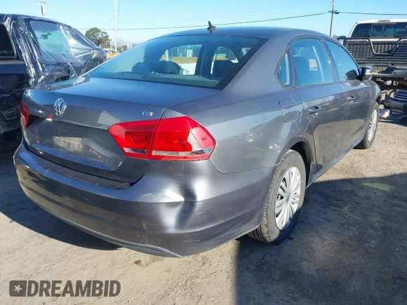 2015 Volkswagen Passat 1.8T Wolfsburg Ed with VIN 1VWAT7A3XFC010262, listed as a IAAI auction lot 41860210 with 99,775 mi miles. Bid and sale history available at carsss.com. Image 4.