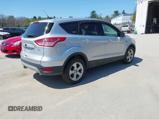2015 Ford Escape SE with VIN 1FMCU9GX0FUB99881, listed as a IAAI auction lot 42114415 with 138,561 mi miles. Bid and sale history available at carsss.com. Image 4.