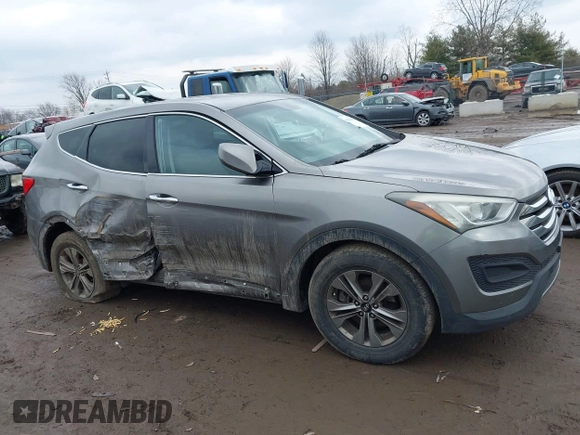 2016 Hyundai Santa Fe z VIN 5XYZTDLB1GG343763, wystawiony jako IAAI lot #41659641 z przebiegiem 96 415 mil mil oraz . Historia ofert i sprzedaży dostępna na DreamBid. Obrazek 13.