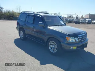 2003 Lexus LX with VIN JTJHT00W033531066, listed as a IAAI auction lot 41969617 with 209,710 mi miles. Bid and sale history available at carsss.com. Image 1.