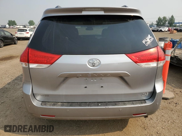 2014 Toyota Sienna Limited with VIN 5TDDK3DC4ES073698, listed as a Copart auction lot 60848915 with 418,121 mi miles and Salvage title. Bid and sale history available at DreamBid. Image 6.