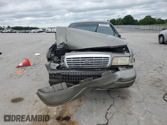 2003 Ford Police Interceptor Street Appear with VIN 2FAFP71W83X132646, listed as a Copart auction lot 55864205 with 211,073 mi miles and Salvage title. Bid and sale history available at DreamBid. Image 5.
