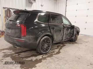 2021 Kia Telluride EX with VIN 5XYP3DHC5MG105113, listed as a IAAI auction lot 41395778 with 90,353 mi miles and . Bid and sale history available at DreamBid. Image 4.