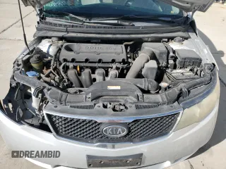 2010 Kia Forte EX z VIN KNAFU4A21A5066595, wystawiony jako Copart lot #53303195 z przebiegiem 190 992 mil mil oraz Nie do naprawy. Historia ofert i sprzedaży dostępna na DreamBid. Obrazek 11.