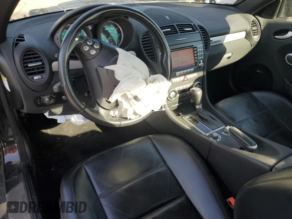 2006 Mercedes-Benz SLK-Class 5.5L AMG with VIN WDBWK73F06F082698, listed as a Copart auction lot 81430534 with 129,545 mi miles and Salvage Title. Bid and sale history available at carsss.com. Image 8.