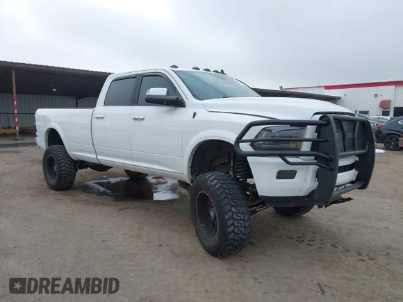 2014 Ram 2500 with VIN 3C6TR5KT3EG309771, listed as a IAAI auction lot 41213964 with 136,617 mi miles and . Bid and sale history available at DreamBid. Image 1.