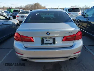 2019 BMW 5 Series 540i with VIN WBAJE5C58KWE66057, listed as a IAAI auction lot 41721886 with 119,712 mi miles and . Bid and sale history available at DreamBid. Image 16.