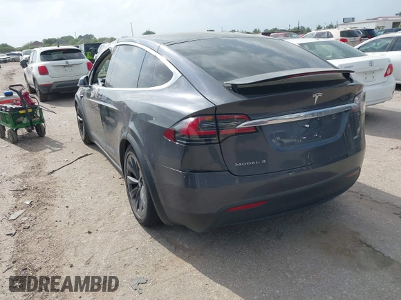 2018 Tesla Model X 75D with VIN 5YJXCDE21JF139712, listed as a IAAI auction lot 41905326 with Not Provided miles and . Bid and sale history available at carsss.com. Image 3.
