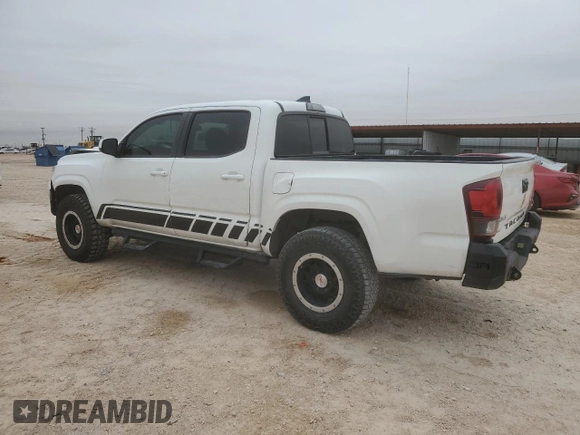 2018 Toyota Tacoma SR with VIN 3TMCZ5AN4JM143350, listed as a Copart auction lot 83234524 with 70,853 mi miles and Clean Title. Bid and sale history available at DreamBid. Image 2.
