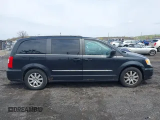 2011 Chrysler Town & Country Touring L with VIN 2A4RR8DG7BR641782, listed as a IAAI auction lot 42042025 with 141,884 mi miles and . Bid and sale history available at DreamBid. Image 12.