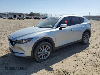 2021 Mazda CX-5 Grand Touring with VIN JM3KFADM6M0387094, listed as a Copart auction lot 48350845 with 94,701 mi miles and Salvage Title. Bid and sale history available at carsss.com. Image 1.